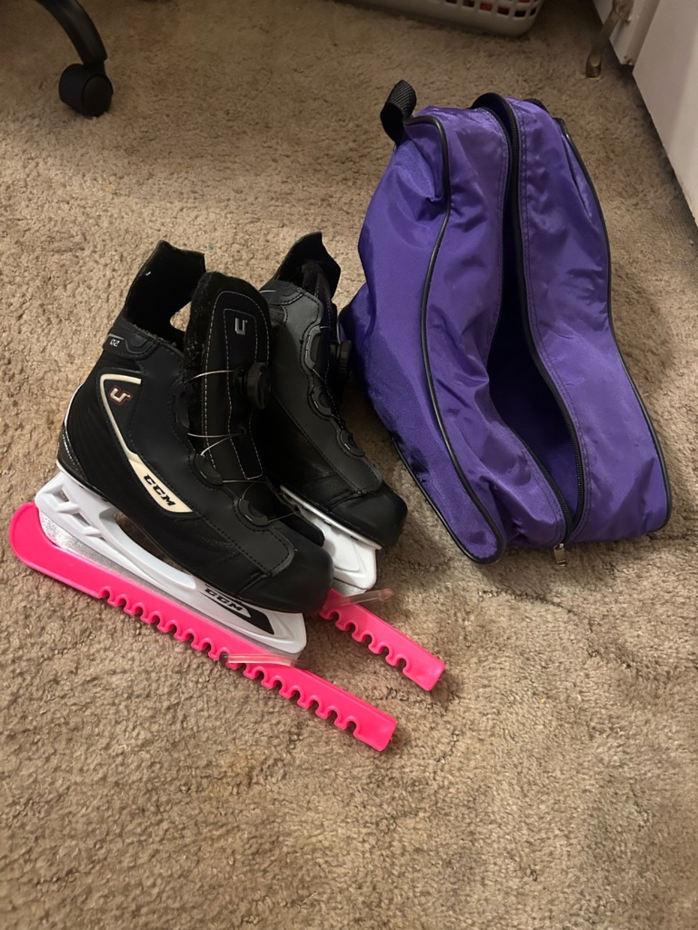 CCM Black Youth size 3 Hockey Skates with Pink Blade Covers and Purple Skate Bag